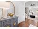 Stylish foyer featuring hardwood flooring and decorative cabinet at 6449 Silver Star Ln, Charlotte, NC 28210