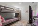 Charming bedroom featuring a cozy bunk bed, soft rug, and tasteful decor at 668 Pointe Andrews Sw Dr # 93, Concord, NC 28025