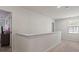Second floor hallway area with carpet, natural light, and doorway views into adjoining rooms at 668 Pointe Andrews Sw Dr # 93, Concord, NC 28025