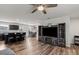 Inviting open-concept living room with hardwood floors leading to a modern kitchen at 668 Pointe Andrews Sw Dr # 93, Concord, NC 28025