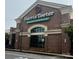 Commercial building displaying prominent 'Harris Teeter' and 'Neighborhood Food & Pharmacy' signage at 7035 Walnut Branch Ln, Charlotte, NC 28277