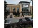 Exterior view of Lifetime Athletic with large windows and a parking lot with several cars at 7035 Walnut Branch Ln, Charlotte, NC 28277