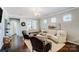 Inviting living room showcases a cozy seating area, natural light, and stylish decor at 7035 Walnut Branch Ln, Charlotte, NC 28277