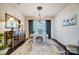 A home office featuring a chandelier, an ornate mirror, and a decorative ceiling medallion at 7035 Walnut Branch Ln, Charlotte, NC 28277