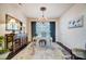 Charming office space with elegant chandelier, decorative furniture, and a tranquil ambiance at 7035 Walnut Branch Ln, Charlotte, NC 28277