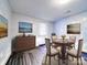 Cozy dining room featuring modern decor, neutral walls, and hardwood floors at 709 High St, Albemarle, NC 28001