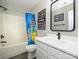 bathroom with a playful shower curtain and plenty of counter space at 7220 Hidden Creek Dr, Charlotte, NC 28214