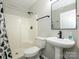 Modern bathroom featuring a shower, vanity with black hardware, and updated fixtures at 7220 Hidden Creek Dr, Charlotte, NC 28214