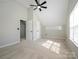 Neutral colored bedroom with carpet, closet and natural light at 7220 Hidden Creek Dr, Charlotte, NC 28214