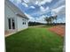 Expansive backyard with a manicured lawn, offering picturesque views of the surrounding greenery at 7441 Fighting Creek Rd # 30, Sherrills Ford, NC 28673