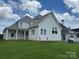 Spacious backyard with a well-maintained lawn and classic siding, perfect for outdoor activities at 7441 Fighting Creek Rd # 30, Sherrills Ford, NC 28673