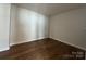 Bright, spacious bedroom featuring hardwood floors and neutral wall tones at 7441 Fighting Creek Rd # 30, Sherrills Ford, NC 28673