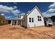 Home exterior showcasing white siding, a grey roof, and multiple windows at 7441 Fighting Creek Rd # 30, Sherrills Ford, NC 28673