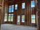 Exposed frame living room showing the expansive window design and natural light at 7441 Fighting Creek Rd # 30, Sherrills Ford, NC 28673