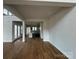 Bright living room featuring hardwood floors and an open layout, flowing into the kitchen area at 7441 Fighting Creek Rd # 30, Sherrills Ford, NC 28673