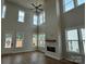 Finished two-story living room showcasing a fireplace and large windows for ample natural light at 7441 Fighting Creek Rd # 30, Sherrills Ford, NC 28673