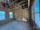 Framed space with visible window placements and structural supports, showing the room's basic layout at 7441 Fighting Creek Rd # 30, Sherrills Ford, NC 28673