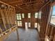 Upward shot showcasing the wood frame and window placements during the construction phase of this room at 7441 Fighting Creek Rd # 30, Sherrills Ford, NC 28673