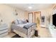Inviting bedroom with soft carpet, decorative crown, ensuite bathroom and large closet at 1035 Nw Wexford Pl # D3, Concord, NC 28027