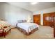 Comfortable bedroom with neutral colors, carpeted floors, and a closet at 11 Courageous St, Lake Wylie, SC 29710