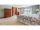Spacious main bedroom with a walk-out to a deck and an ensuite bathroom, along with neutral-colored carpet at 11 Courageous St, Lake Wylie, SC 29710