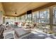 Bright sunroom with large windows and decorative stone flooring at 11 Courageous St, Lake Wylie, SC 29710