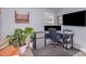 Bright bedroom featuring neutral walls and decor, with a workspace, and ample natural light at 110 Weeping Willow Way, Gastonia, NC 28052