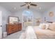 Spacious bedroom with arch window, neutral decor, and natural light, creating a calming atmosphere at 110 Weeping Willow Way, Gastonia, NC 28052