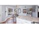 Bright breakfast nook featuring a round table, bar stools, hardwood floors, and plenty of natural light at 110 Weeping Willow Way, Gastonia, NC 28052