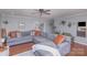 Spacious living room featuring hardwood floors, a sectional sofa, and stylish decor at 110 Weeping Willow Way, Gastonia, NC 28052