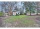 Spacious backyard with shed and beautiful landscaping at 121 Wonderwood Dr, Charlotte, NC 28211