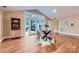 Bright dining area with a glass table, seating for four, and patio access at 121 Wonderwood Dr, Charlotte, NC 28211