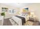 Cozy bedroom showcasing a queen bed, soft lighting, and stylish decor at 1323 Queens Rd # 218, Charlotte, NC 28207