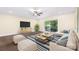 Bright living room featuring hardwood floors, neutral paint, and sliding doors to a patio at 1323 Queens Rd # 218, Charlotte, NC 28207