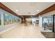 Spacious lobby with wood slat ceiling, neutral decor, and modern art at 1323 Queens Rd # 218, Charlotte, NC 28207