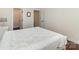 Bedroom featuring a bed with decorative quilt and access to a walk-in closet at 15727 Kiser Corner Ln, Davidson, NC 28036