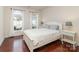 Cozy bedroom with hardwood floors, natural light, and a bright, airy feel at 15727 Kiser Corner Ln, Davidson, NC 28036