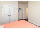 Bright bedroom features double doors for closet space and light colored walls at 15727 Kiser Corner Ln, Davidson, NC 28036