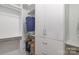 Well-organized walk-in closet with shelving, drawers, and hanging space at 15727 Kiser Corner Ln, Davidson, NC 28036