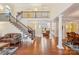 Grand foyer with staircase, wood floors, and soaring ceilings at 16506 Doves Canyon Ln, Charlotte, NC 28278