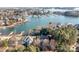 Stunning aerial view of luxurious waterfront homes with private docks and serene lake access at 18302 Town Harbour Rd, Cornelius, NC 28031