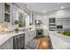 Gourmet kitchen featuring marble countertops, and stainless steel appliances at 18302 Town Harbour Rd, Cornelius, NC 28031