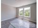 Bedroom features carpet and two bright windows that provides an abundance of natural light at 240 Mark Ryan Ln, Dallas, NC 28034