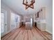 Spacious open kitchen with an island, stainless steel appliances, and modern light fixtures at 240 Mark Ryan Ln, Dallas, NC 28034