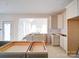 Bright new kitchen with unfinished cabinets and an opening into the dining area at 240 Mark Ryan Ln, Dallas, NC 28034