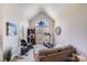 Bright bonus room featuring exercise equipment and a large arched window for natural light at 2813 Monterrey Ln, Monroe, NC 28110