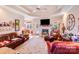 Bright living room with fireplace open to the breakfast nook at 2813 Monterrey Ln, Monroe, NC 28110