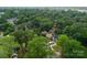 Lush green aerial view showcases a charming neighborhood with tree-lined streets and well-maintained homes at 3627 Rogers St, Charlotte, NC 28208