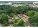 Aerial view displaying the property within a serene, tree-lined neighborhood, showcasing the home's location and setting at 3627 Rogers St, Charlotte, NC 28208