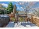 Relaxing back deck with outdoor seating, perfect for enjoying the landscaped backyard at 3757 Fieldhaven Ct, Maiden, NC 28650
